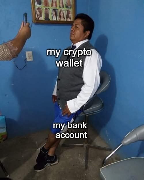 A humorous meme showing a man sitting in a chair taking a photo, with the text "my crypto wallet" labeling his upper body and "my bank account" labeling his shorts—joking that an empty wallet leaves little to cover anything.