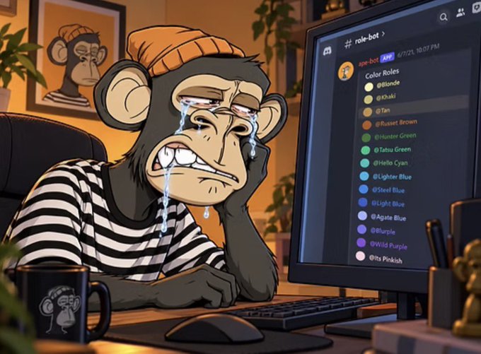 A cartoon monkey wearing an orange beanie and striped shirt cries at a computer showing a Discord role-bot interface with various color roles listed.