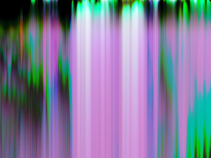 An abstract image featuring vertical streaks of bright neon colors including green, purple, pink, and blue blending together against a black background.