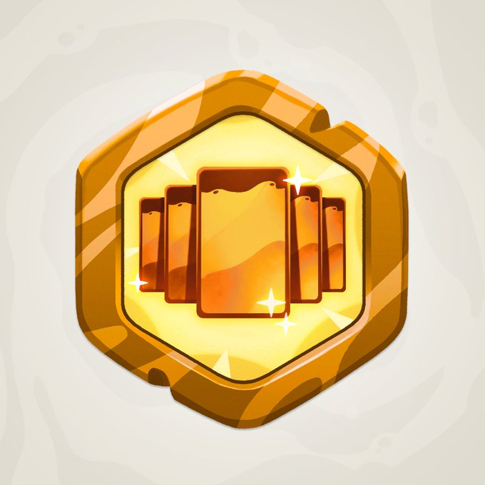 A glossy, cartoon-style game icon or badge features a gold hexagonal frame containing an illustration of five golden cards arranged in a fan pattern against a glowing yellow background with sparkle effects.