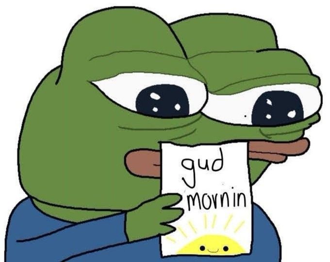 The Pepe the Frog meme holding a handwritten 'gud mornin' sign with a smiling sun illustration at the bottom.