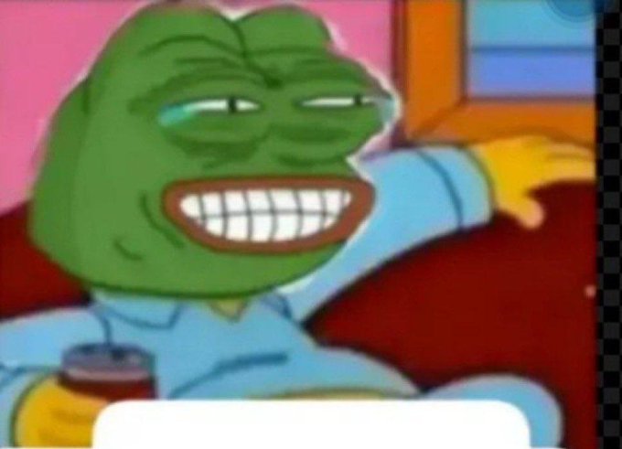 A cartoon Pepe the Frog character wearing a blue sweater is grinning widely with clenched teeth while sitting on a red couch, holding a drink.
