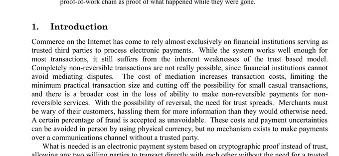 The image shows a white piece of paper with black text written on it. The title "1. Introduction" is at the top of the page, followed by a list of points about internet transactions. The main focus of the image seems to be the content within the document rather than the visual elements surrounding it.