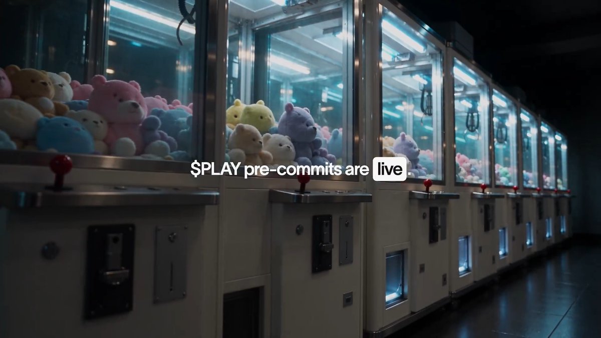 A row of brightly lit claw machines filled with pastel-colored plush bears, with text overlay reading '$PLAY pre-commits are live'.