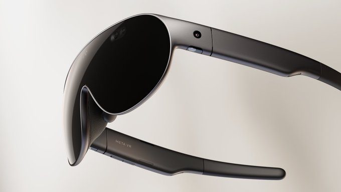 A pair of black Meta VR sunglasses or smart glasses displayed against a light background, with 'META VR' visible on the temple.