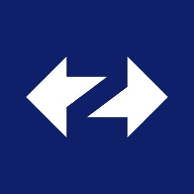 A simple icon showing a white left-pointing arrow connected to a white right-pointing arrow on a solid blue background.