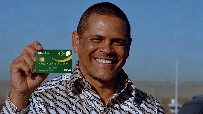 The image shows a man holding up an account with Visa in front of him. He appears happy and smiling. A statement about lending money through credit cards or accounts such as Pendle is also included.
