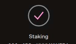 A dark mobile interface featuring a circular gray loading animation with a pink checkmark in the center, above the word 'Staking'.