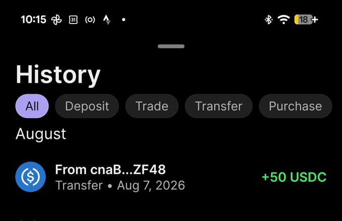 A mobile app screenshot showing a transaction "History" page with filters (All, Deposit, Trade, Transfer, Purchase) and an August entry showing a transfer of "+50 USDC" received from address "cnaB...ZF48" on Aug 7, 2026.