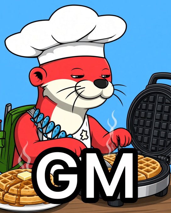 A cartoon red mascot chef with a white hat makes waffles on a waffle iron, with the letters "GM" displayed prominently in the foreground.