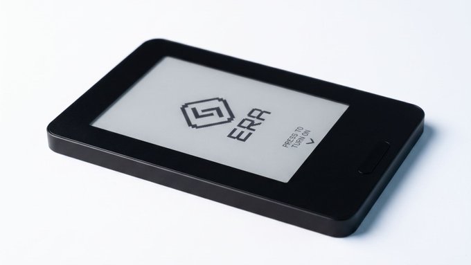 A black e-reader device displays a startup screen featuring the 'ERA' logo and the text 'PRESS TO TURN ON' against a light background.