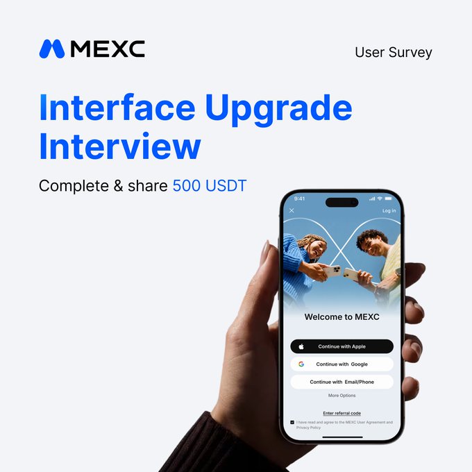 An advertisement for MEXC featuring a hand holding a smartphone showing the app's welcome screen, promoting an 'Interface Upgrade Interview' to 'Complete & share 500 USDT'.