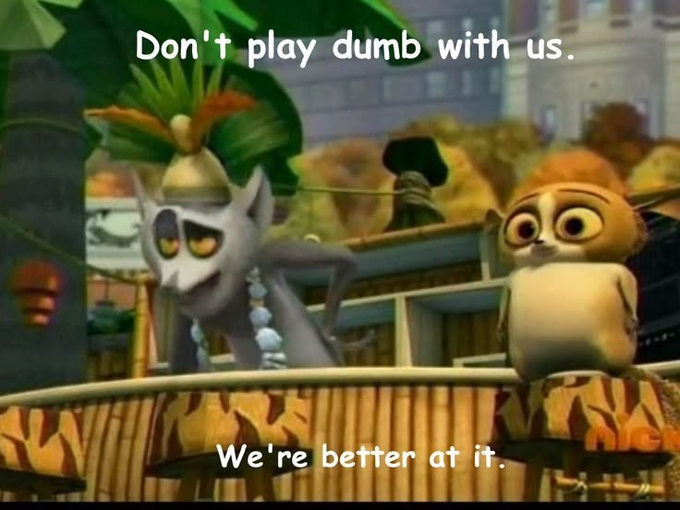 A meme from the animated film 'Puss in Boots: The Last Wish' showing two cat characters with the caption 'Don't play dumb with us. We're better at it.'