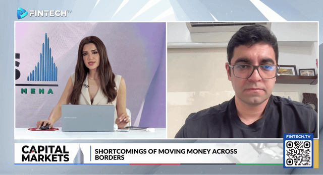 FINTECH TV broadcast titled 'CAPITAL MARKETS' discussing 'SHORTCOMINGS OF MOVING MONEY ACROSS BORDERS', featuring host Mena and a male guest via video call.