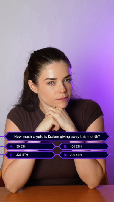 A woman with dark hair pulled back sits with her hands clasped under her chin against a purple-lit background, appearing contemplative. Overlaid on the image is a quiz question reading "How much crypto is Kraken giving away this month?" with answer options A: 50 ETH, B: 100 ETH, C: 225 ETH, and D: 200 ETH, promoting a Kraken referral campaign offering a sign-up bonus.