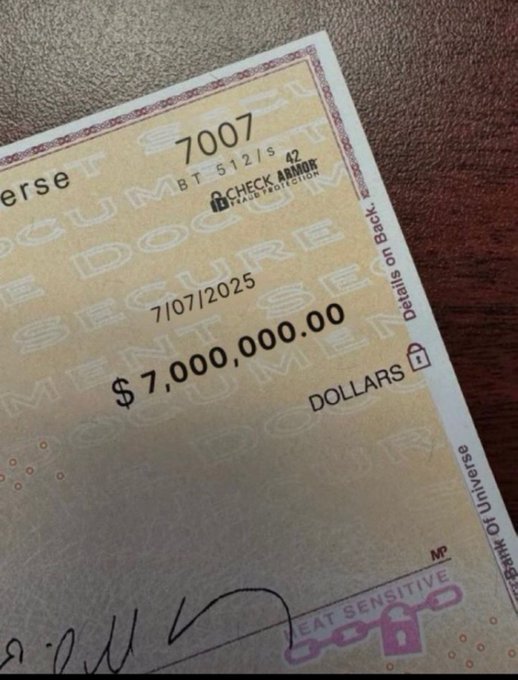 A close-up of a personal check made out for $7,000.00, dated 7/07/2025, with check number 7007.
