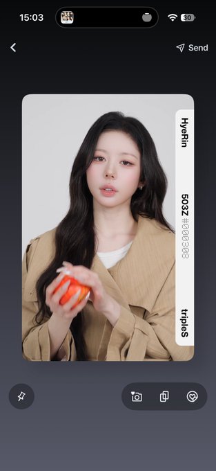 A smartphone screenshot of a messaging app showing a photo of a young woman with long dark hair wearing a beige shirt, with 'Hyarlin' and a number '5022 #000000' and 'trips2010' visible on the side.