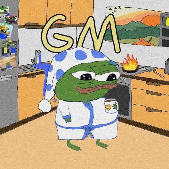 An illustration of Pepe the Frog wearing a blue and white polka-dot nightcap and robe, holding a mug in a kitchen setting, with 'GM' displayed in large yellow letters above.
