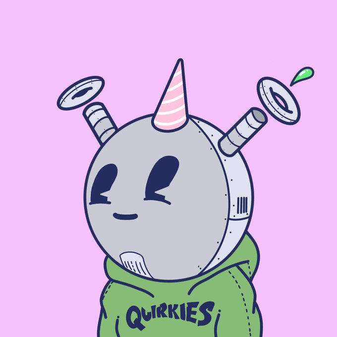 A cartoonish robot character with a unicorn horn, propeller-like ears, and a green hoodie that says 'QUIRKIES' against a pink background.