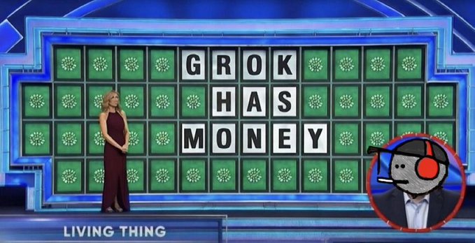The image depicts a scene resembling the game show "Wheel of Fortune," featuring a woman in a burgundy gown standing beside a board that reads "GROK HAS MONEY," with a cartoon figure of the Grok AI robot in a suit and fedora overlaid on the right. The caption "LIVING THING" appears at the bottom, humorously suggesting the answer to the puzzle—a playful nod to $DRB, likely referencing Grok's commentary or a meme tying the AI's financial interests to a trending stock ticker.