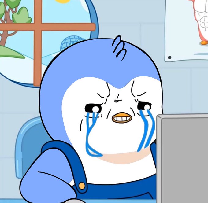 A crying cartoon penguin character sits sadly in front of a laptop, with streams of tears pouring from its eyes, visually representing the regret and frustration of missing out on Bitcoin's price gains. The image humorously captures the "FOMO" (fear of missing out) sentiment expressed in the caption about choosing gaming over crypto investment.