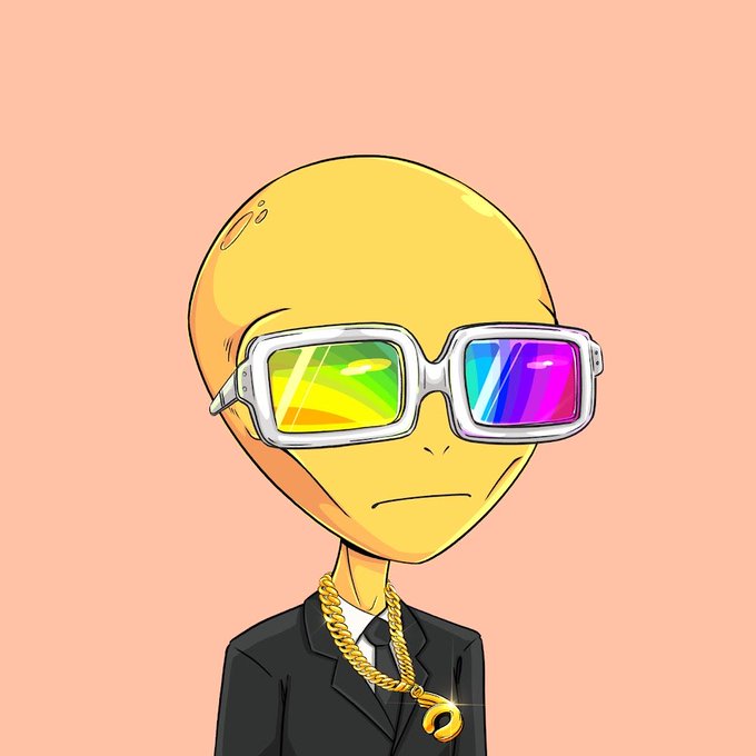 Digital illustration of a yellow cartoon alien character wearing colorful VR-style glasses, a black suit, tie, and a gold rope chain necklace against a peach background.