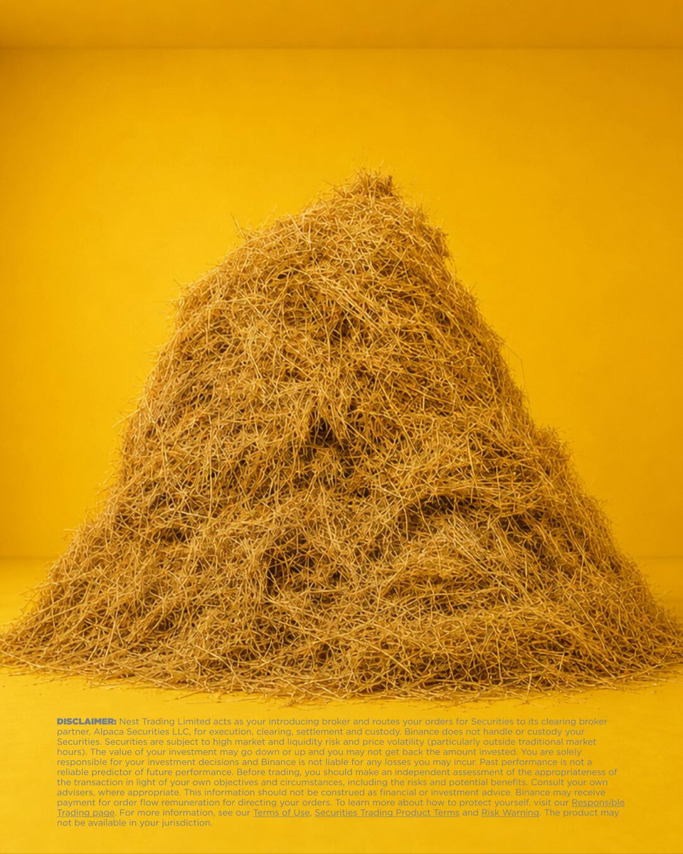 The image features a large pile of hay, which appears to be made from dried grasses or straw. The hay is stacked up against a yellow background, creating an eye-catching contrast. The image also includes text that reads "BNB", possibly indicating the source or type of the hay.