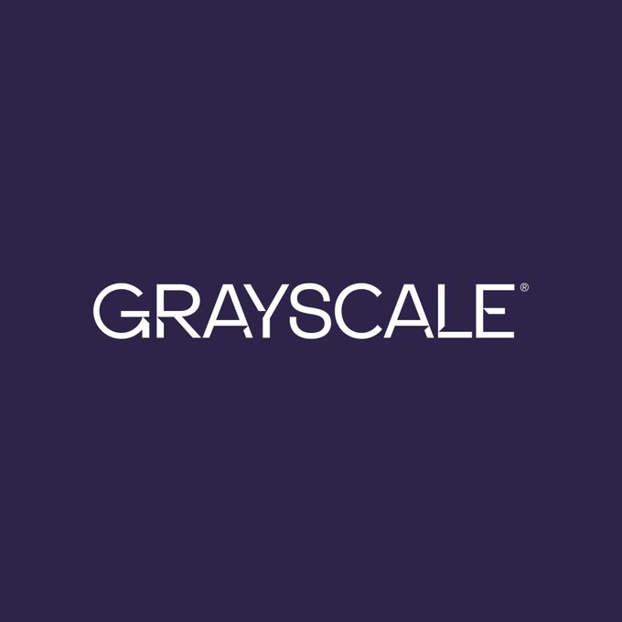 The image displays the "GRAYSCALE®" logo in white text on a dark navy blue background, representing the cryptocurrency asset management firm whose head of research, Zach Pandl, is featured in the accompanying statement discussing Bitcoin's shifting correlations with gold and the Nasdaq.