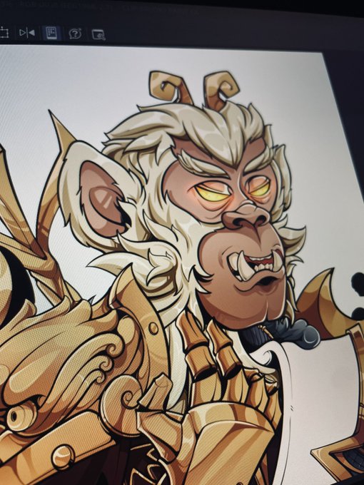 A digital illustration displayed on a monitor shows a fierce, anthropomorphic monkey character wearing golden armor.