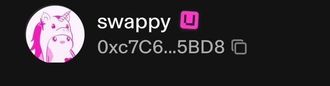 A user profile for "swappy" with the wallet address 0xc7C6...5BD8, featuring a pink cartoon character as the avatar, which corresponds to the $SWAPPY token holder mentioned in the post suggesting a connection to Hayden Adams (Uniswap founder).