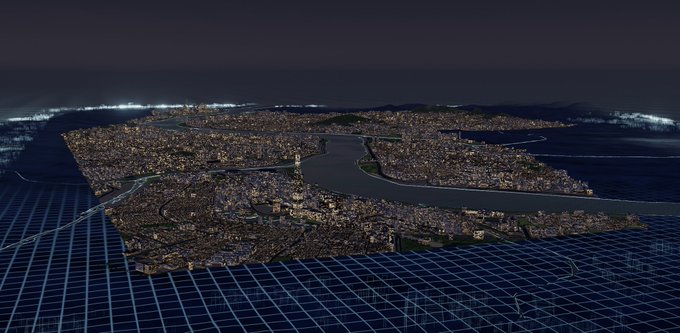 A dark nighttime aerial view of a detailed 3D city map rendered on a blue grid, resembling a digital twin or simulation.