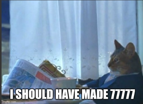 A cat meme with the caption "I SHOULD HAVE MADE 77777" in white text.