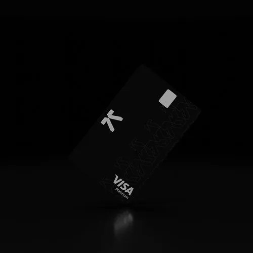 The image features a black Visa credit card with white text, which reads "Visa Platinum". The card is upside down, resting on its edge against a dark background. The text on the card includes phrases such as "@KAST xyz", "Web3 partnerships", and "Solana SOL staking within the app". These elements suggest that the image may be related to a post about the growth of @KAST xyz, which is known for its rapid expansion in the cryptocurrency space. The post also mentions the integration of KAST's infrastructure into the app, highlighting the card's association with the cryptocurrency and blockchain ecosystem.