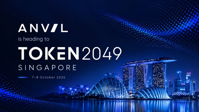 A promotional graphic with text reading 'ANVL is heading to TOKEN2049 SINGAPORE 7-8 October 2026', set against a blue-toned image of Singapore's Marina Bay Sands and skyline.