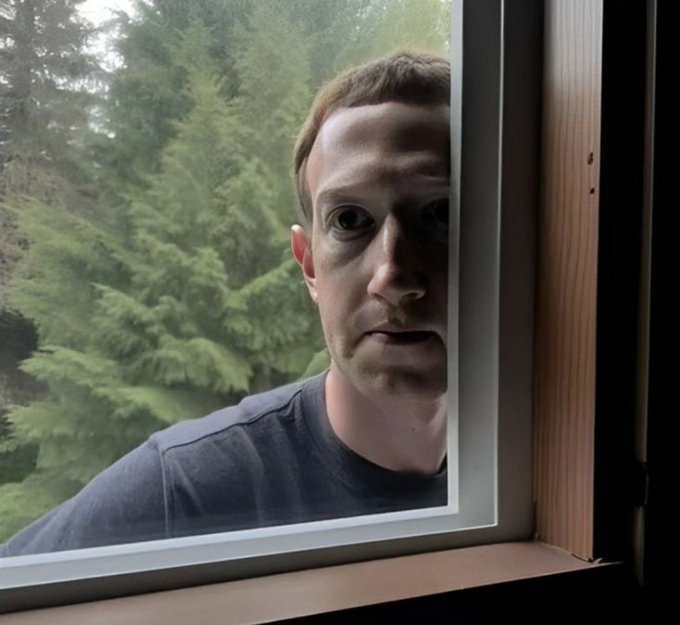 The caption: A man peers through a window into the woods, with only half his face visible, creating a quiet, watchful presence that visually echoes the post's metaphor of someone quietly waiting and watching for a downfall.