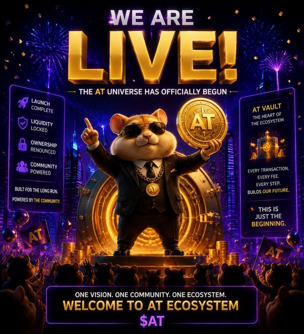 A promotional crypto poster reading 'WE ARE LIVE! THE AT UNIVERSE HAS OFFICIALLY BEGUN' featuring an anthropomorphic hamster in a suit holding an AT coin, with sections for 'LAUNCH COMPLETE', 'LIQUIDITY LOCKED', 'OWNERSHIP RENOUNCED', 'COMMUNITY POWERED', and 'AT VAULT'.