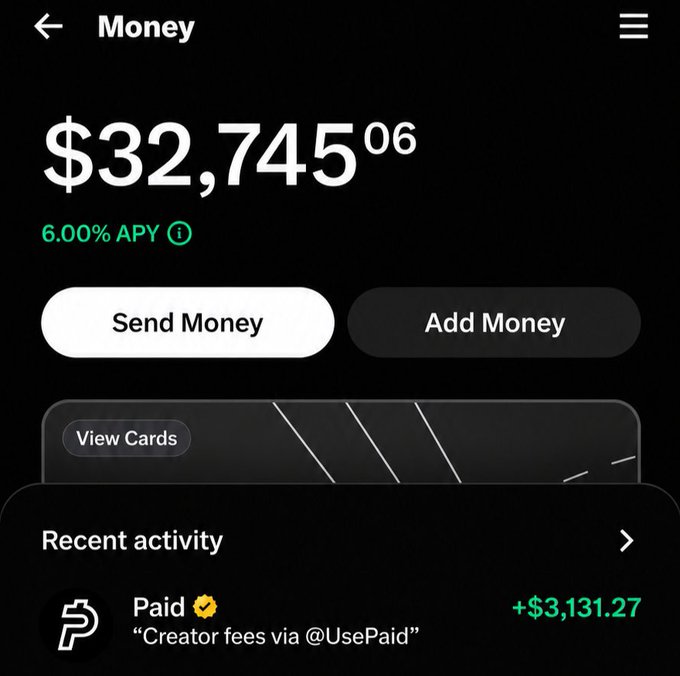 A mobile banking app screenshot showing a money balance of $32,745.06 with 6.00% APY, featuring 'Send Money' and 'Add Money' buttons, and a recent activity entry showing a '+ $3,131.27' payment from 'Creator fees via @UsePaid'.