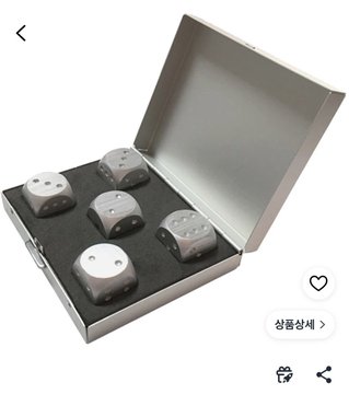The image shows a set of six metallic dice with a brushed steel finish, neatly arranged in a black foam-lined box. Notably, one die has a Bitcoin "₿" symbol in place of the traditional dot, making it a perfect fit for the post about a Bitcoin-themed dice set.