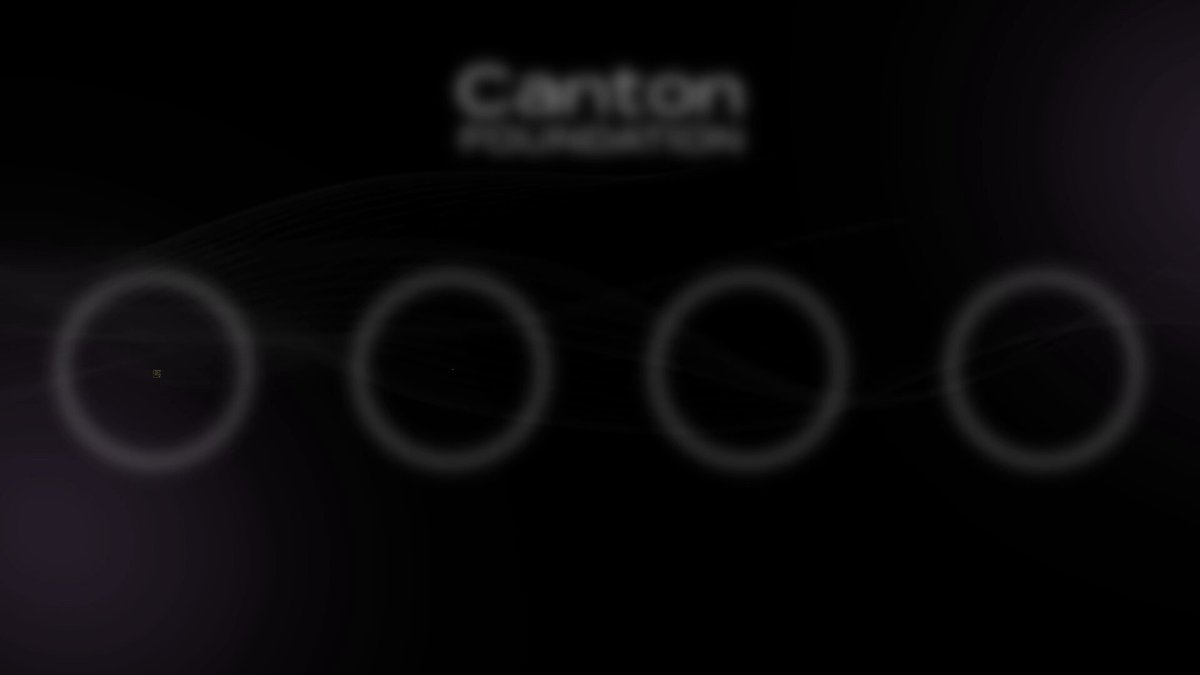 The image shows a black background with white text that reads "Canton Foundation" at the top of the screen. Below this, there are four circles arranged vertically, each containing a number from 0 to 3. The numbers are not clearly visible due to the blurriness in the image.