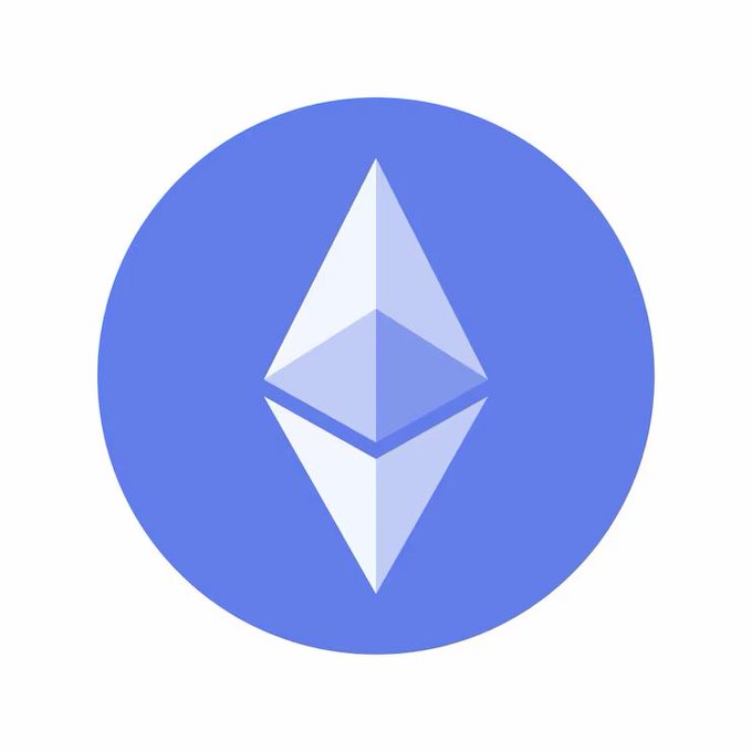 Ethereum (ETH) logo displayed as a light diamond-shaped octahedron on a blue circular background.