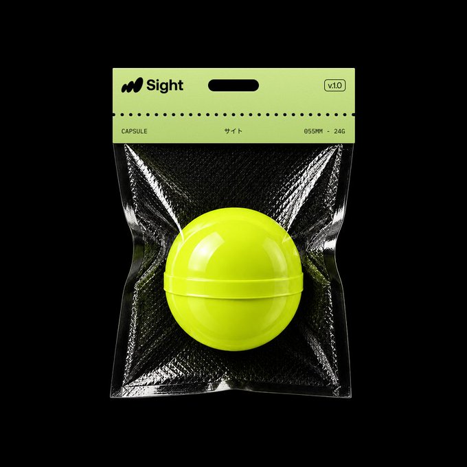 A product mockup of a neon yellow-green spherical capsule toy sealed in clear plastic packaging with a green header card labeled 'Sight v.1.0' and 'CAPSULE'.