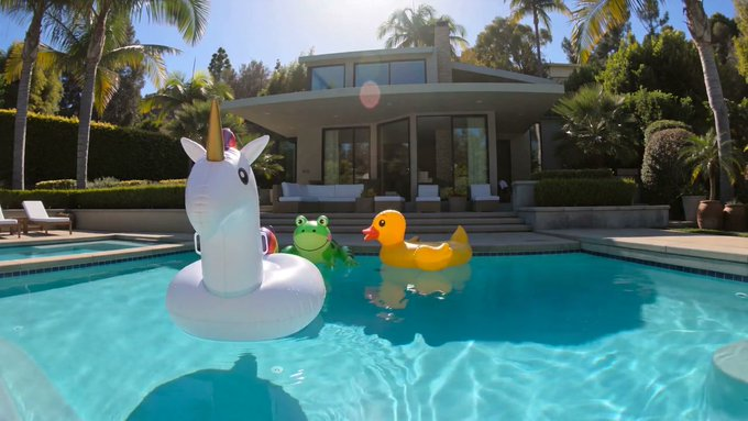 A vibrant pool scene featuring inflatable toys—a unicorn, frog, and yellow duck—floating in the water of a luxurious backyard pool.

The image shows inflatable pool toys floating in a swimming pool, which thematically contrasts with the post's discussion of "Pools" (referring to the @pools_dot_fun platform and liquidity pools), though the image itself contains no visible text, numbers, or identifying information related to the cryptocurrency announcement.