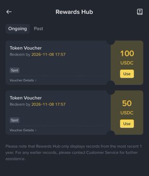 A mobile app screenshot titled 'Rewards Hub' displaying two Token Vouchers for 100 USDC and 50 USDC, redeemable by 2026-11-08.