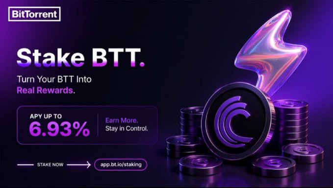 A promotional graphic for BitTorrent staking that reads 'Stake BTT. Turn Your BTT Into Real Rewards.' with 'APY UP TO 6.93%' and a link to 'app.bt.io/staking', featuring stacks of purple BTT cryptocurrency coins and a stylized upward arrow.