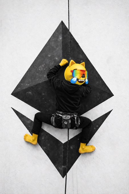 A surreal artwork showing a person sitting on a large Ethereum logo, wearing a laughing-crying emoji mask with cat ears and yellow gloves, against a concrete wall background.