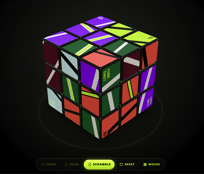 A 3D rendering of a scrambled Rubik's Cube-style puzzle featuring purple, green, red, and white colored sections with geometric patterns and labels like 'CUBE TWIST' and 'R2', displayed with Undo, Redo, Scramble, Reset, and Moves controls.