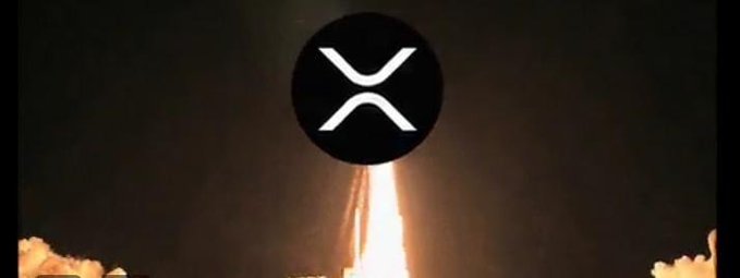 The image shows a rocket launching with bright flames and billowing smoke against a dark sky, overlaid with the XRP cryptocurrency logo (a stylized "X") in a black circle. This visually reinforces the post's message about the Clarity Act positioning #XRP for a major upward "takeoff."