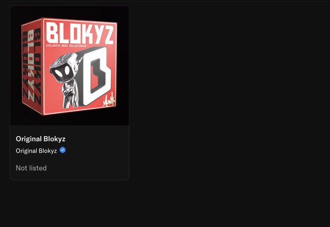The image shows a digital product listing titled "Original Blokyz" with a verified checkmark and "Not listed" status, featuring the red BLOKYZ branded collectible box with its iconic "B" logo. This relates to the post as the author expresses disappointment about missing out on the "OG role" for this Original Blokyz collection, while celebrating holding at least one collectible and hoping to win more through a raffle.