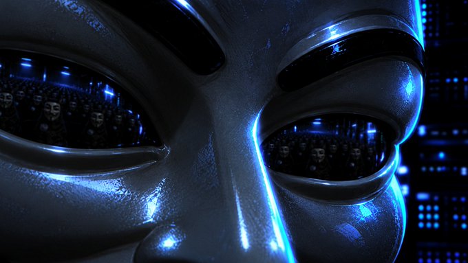 A close-up 3D rendering of a metallic blue Guy Fawkes mask with reflective eyes showing a crowd of people holding phones, set against a dark background with digital data elements.