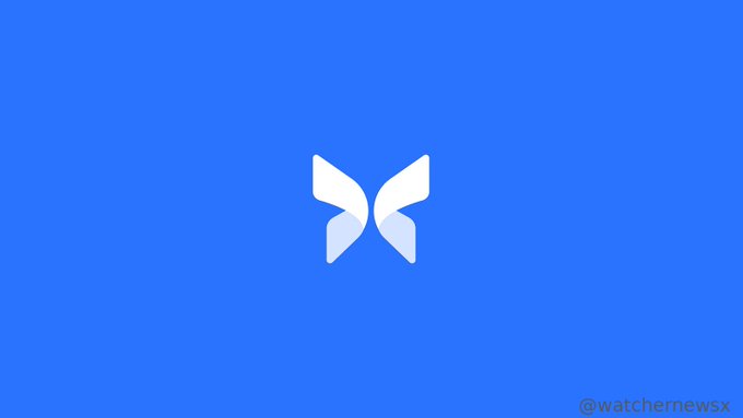 A blue screen displaying a white butterfly-like logo, with the watermark '@watchernewsx' in the bottom right corner.